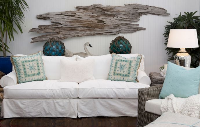 Slipcovered Sofa and Driftwood Wall ARt