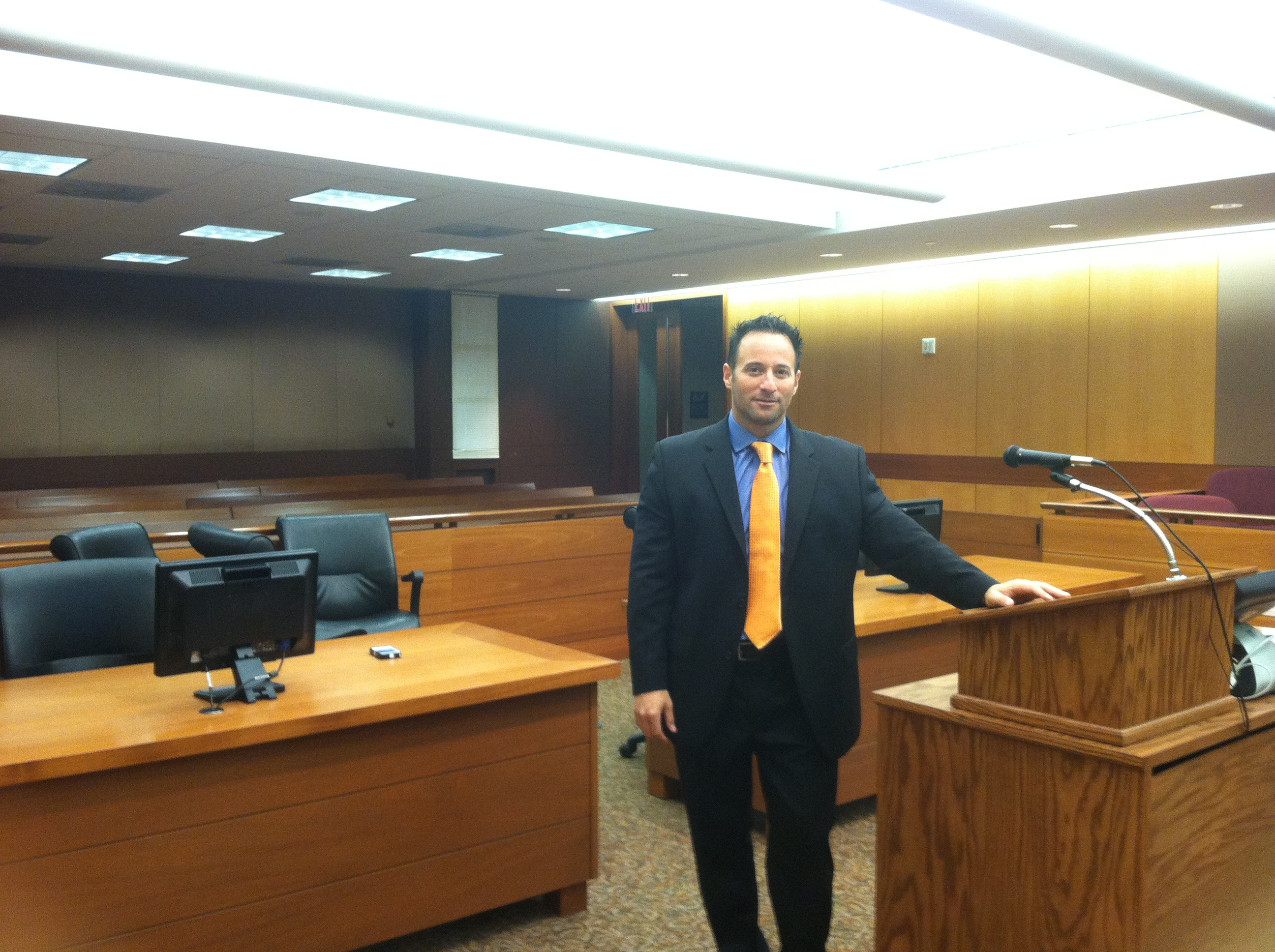 In court after criminal case victory.