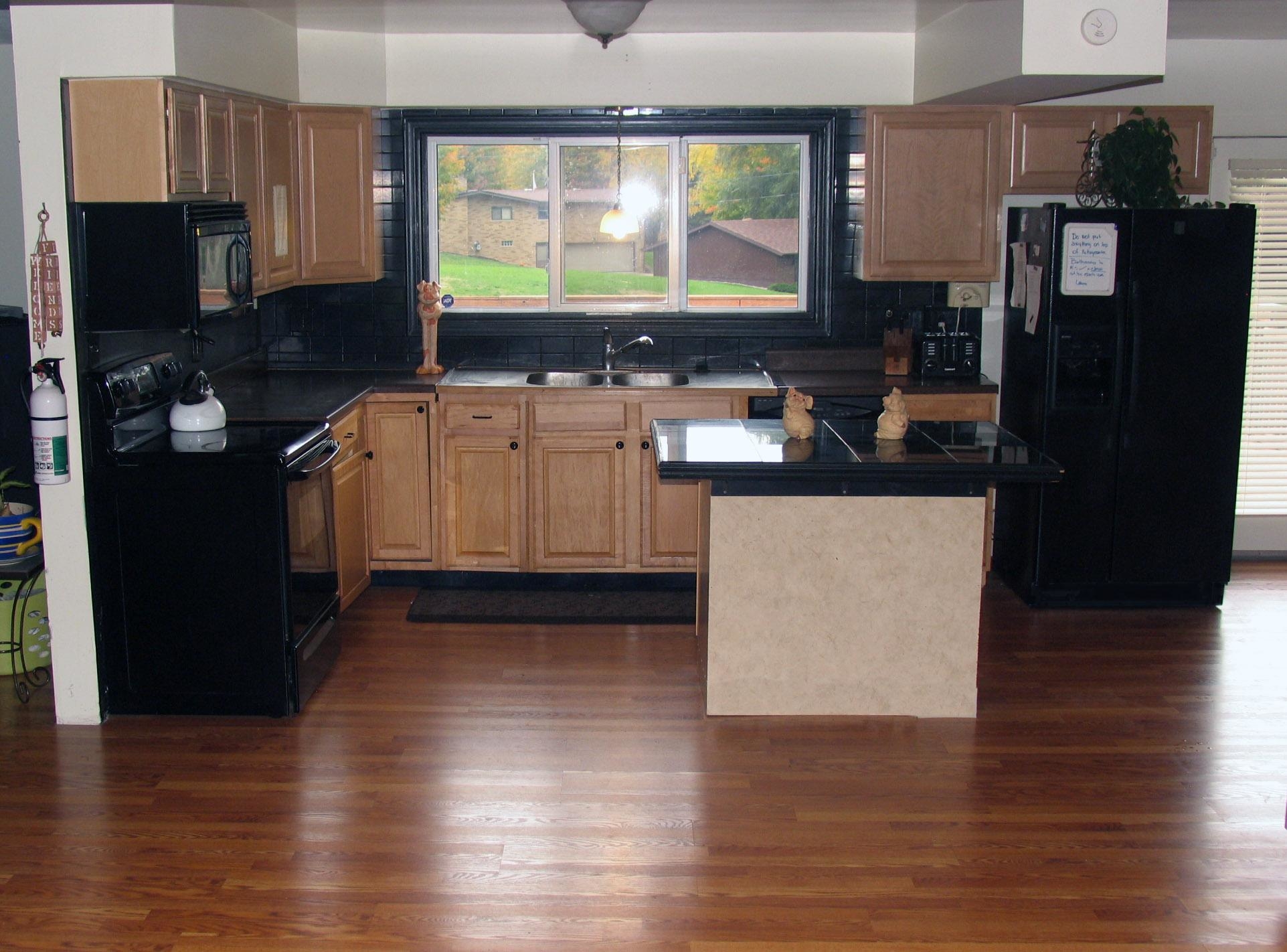 Large Kitchen in the middle of the house to better view all residents