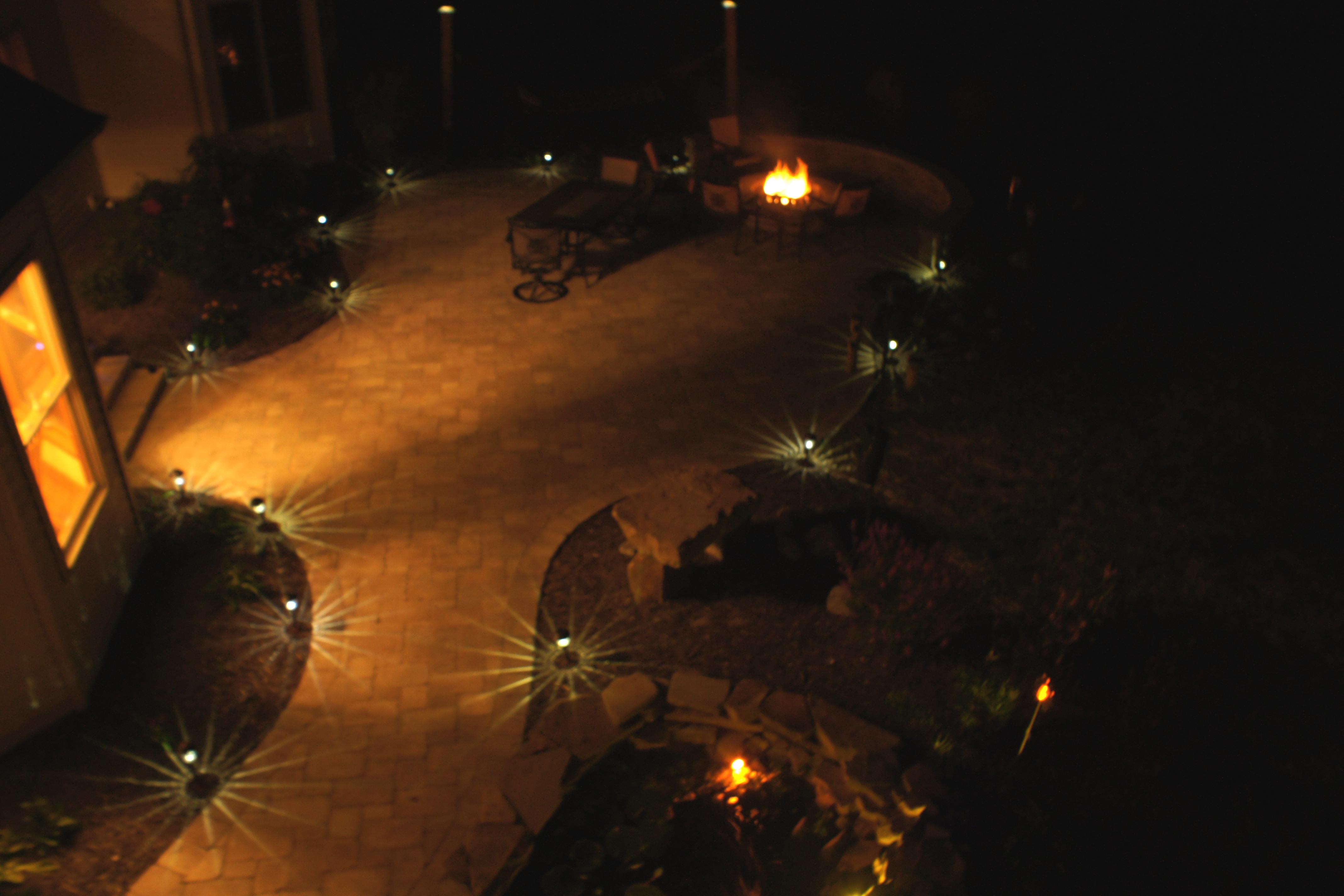 A Unilock paver patio Palmer's installed in Brunswick Hills 2012 at night.