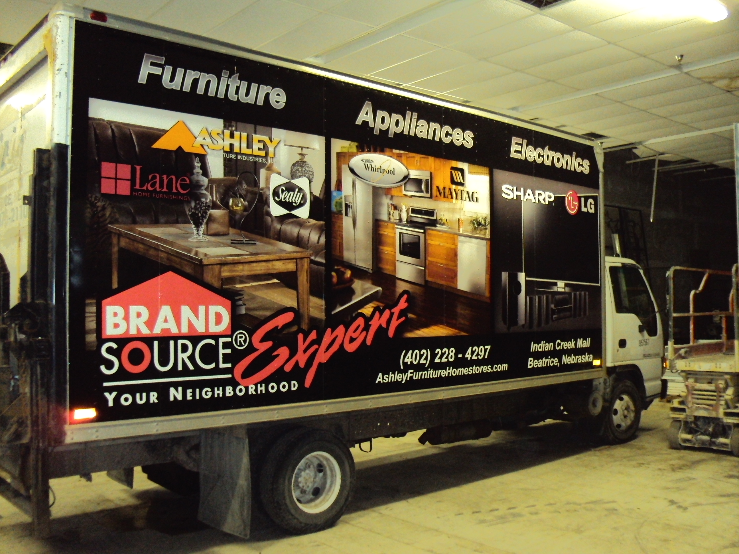 Furniture company delivery truck.