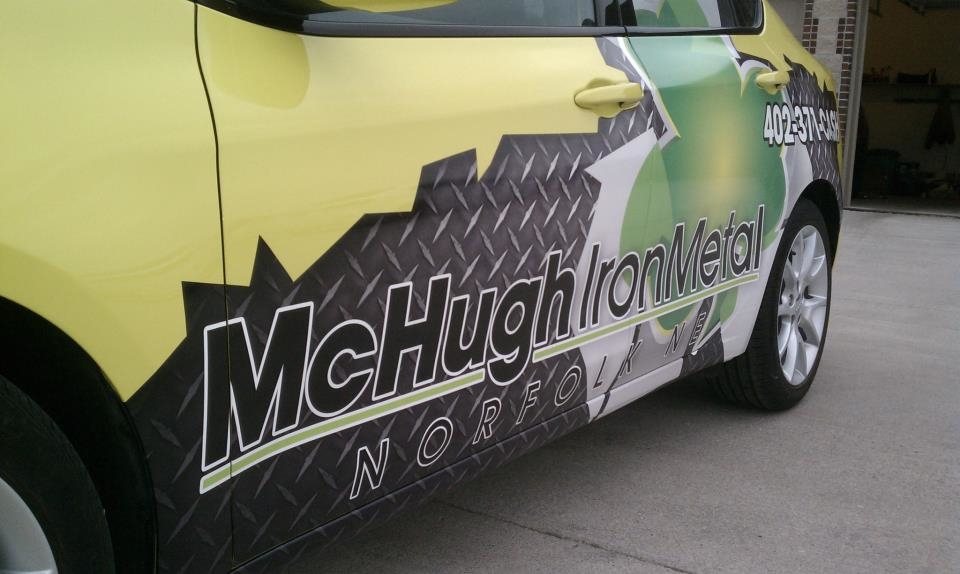 Partial Wrap on a lime green Dodge Dart. Partial wraps can be a very effective, less expensive alternative to a full wrap.