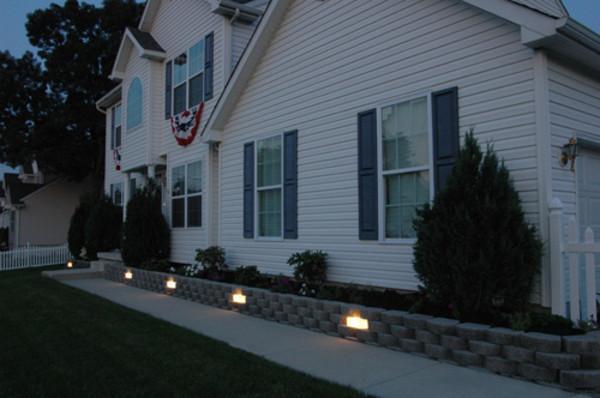 Add interest & nighttime safety to your retaining wall.