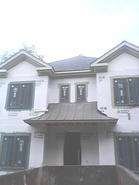 Shingle roofing and metal roofing