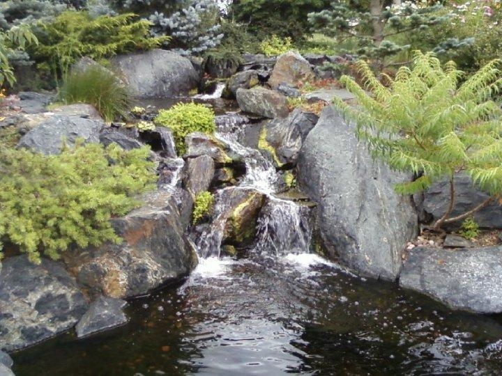 Beautiful waterfalls with cascading water add soothing sounds to your private space.