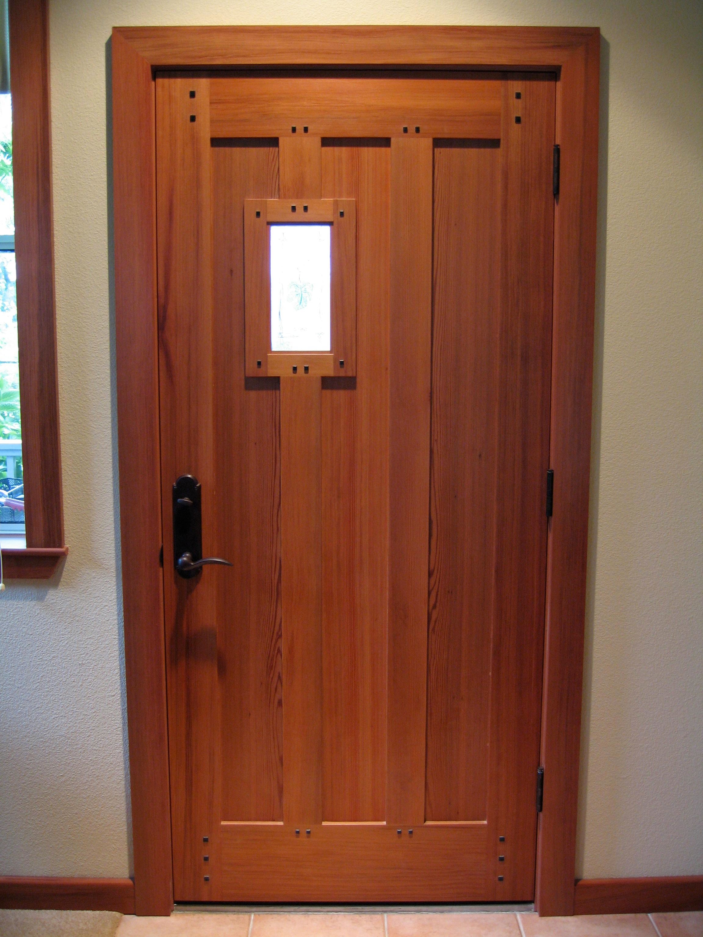 Custom salvaged Redwood mortise & tenon Ebony pegged craftsman door designed & handcrafted by Philip Snyder of PS Woodworking adds elegance and style to the entrance of your home.