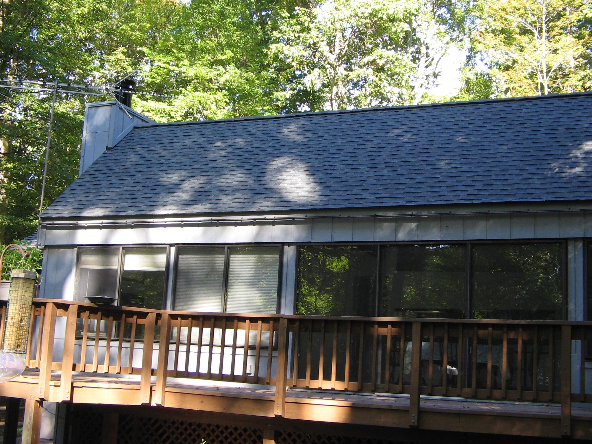 Roof job and deck stain
